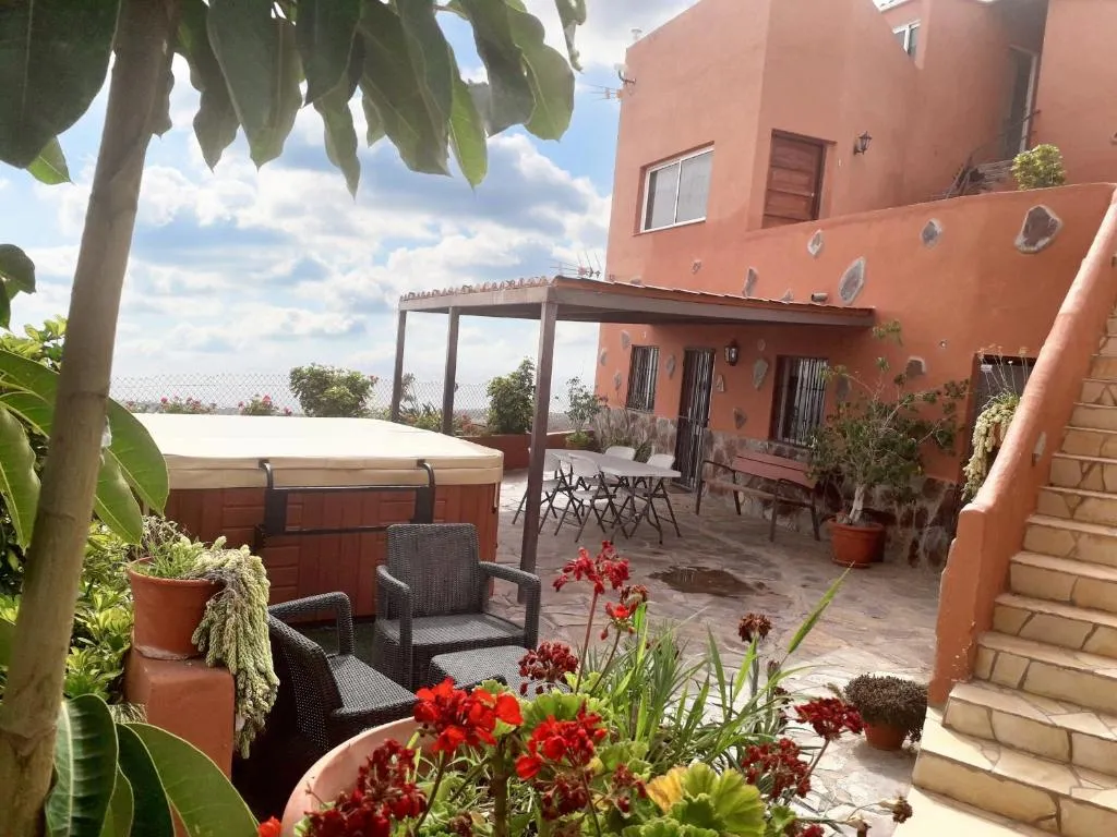 Image of 2 bedrooms house with sea view jacuzzi and enclosed garden at Adeje 1 km away from the beach